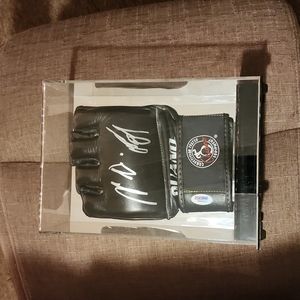 UFC glove. Signed by BOTH nick and nate diaz!